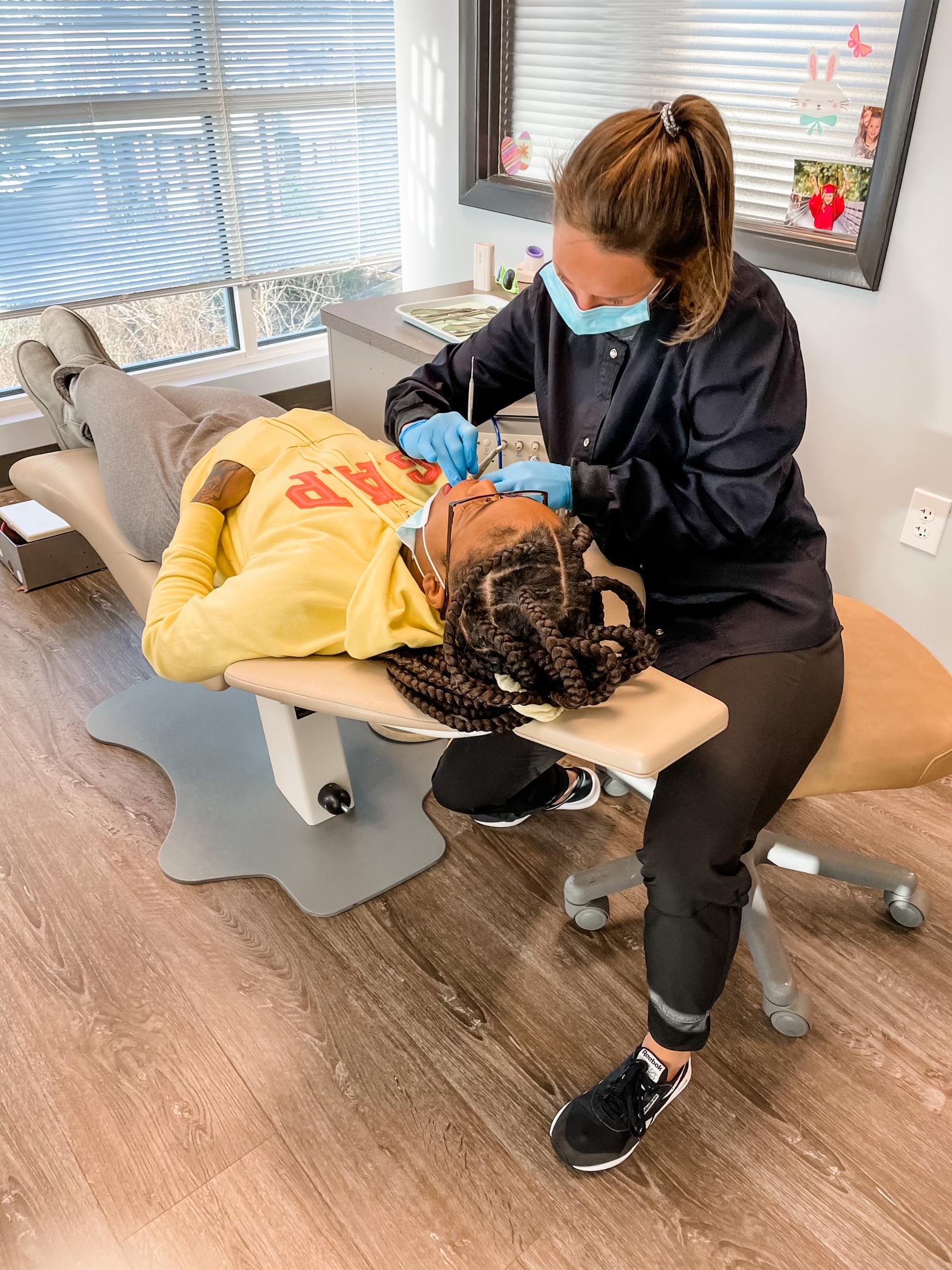 Orthodontics Assistant working on a patient in Concord North Carolina. This is near Kannapolis, Charlotte, Harrisburg, and Huntersville.