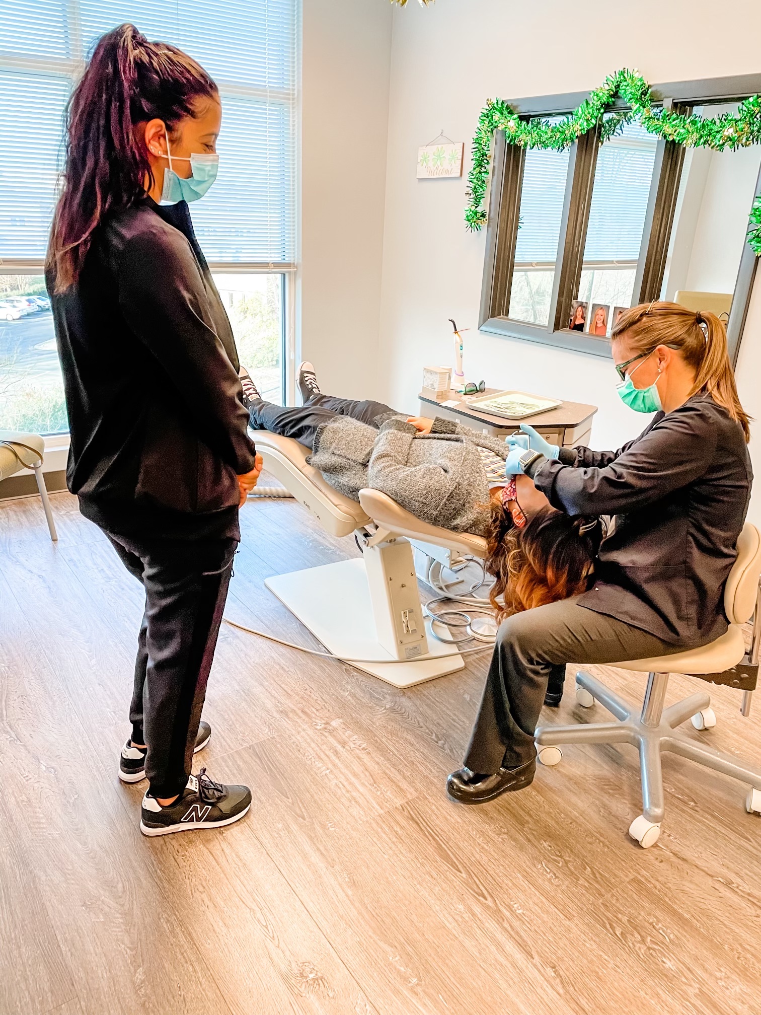 Orthodontics Assistant working on a patient in Concord North Carolina. This is near Kannapolis, Charlotte, Harrisburg, and Huntersville.