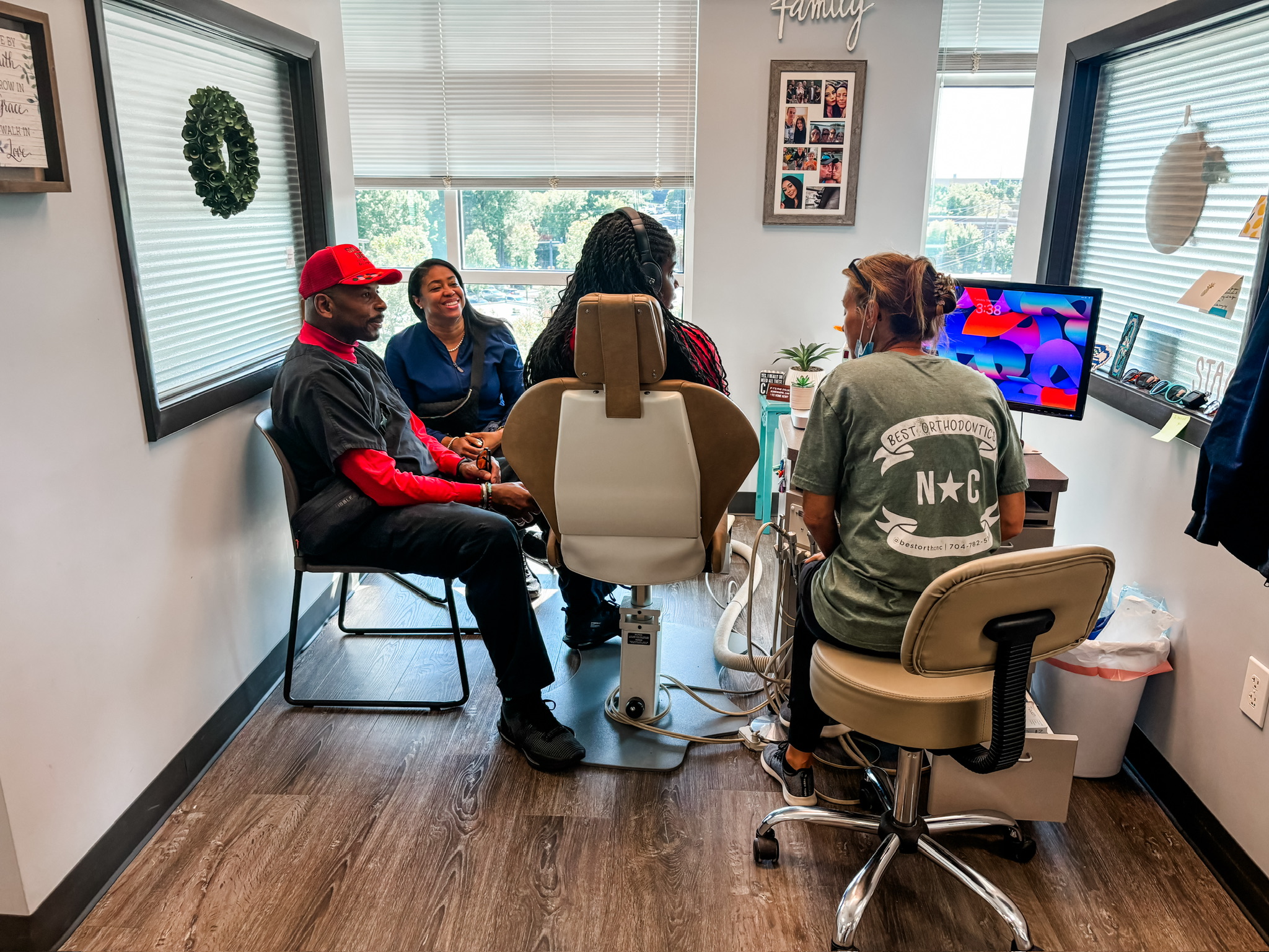 parents watch child's braces appointment